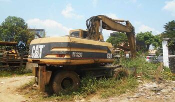 Location engin pelle excavatrice Caterpillar M320 à Douala complet