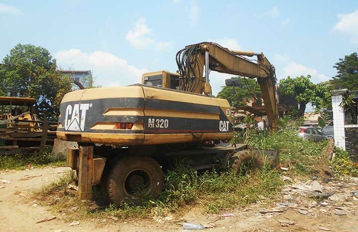 Location engin pelle excavatrice Caterpillar M320 à Douala complet